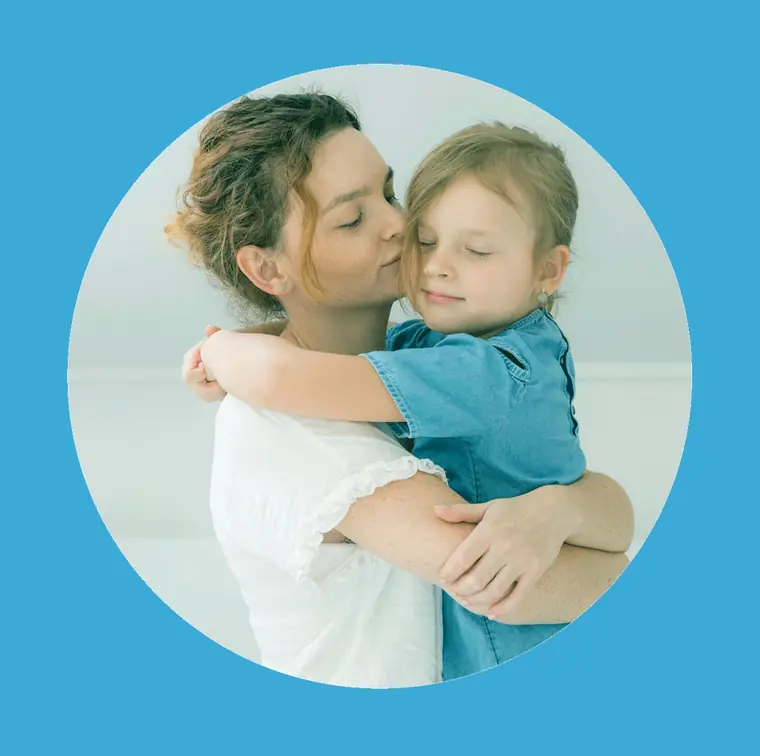 A mother and child sharing a tender, mindful embrace